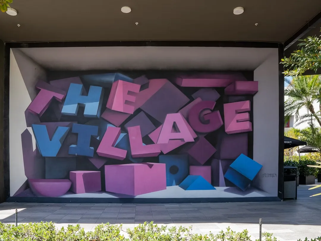 The Village Blocks — mural by Carmo in Hallandale Beach, FL
